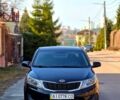Чорний Кіа Ріо, об'ємом двигуна 1.4 л та пробігом 180 тис. км за 6500 $, фото 1 на Automoto.ua
