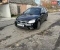 Чорний Кіа Ріо, об'ємом двигуна 1.4 л та пробігом 105 тис. км за 4400 $, фото 1 на Automoto.ua