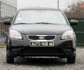 Черный Киа Рио, объемом двигателя 1.4 л и пробегом 100 тыс. км за 5000 $, фото 3 на Automoto.ua