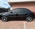 Черный Киа Рио, объемом двигателя 1.4 л и пробегом 182 тыс. км за 6500 $, фото 4 на Automoto.ua