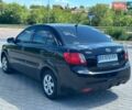 Чорний Кіа Ріо, об'ємом двигуна 1.4 л та пробігом 50 тис. км за 4899 $, фото 5 на Automoto.ua