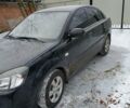 Черный Киа Рио, объемом двигателя 1.4 л и пробегом 100 тыс. км за 5800 $, фото 6 на Automoto.ua
