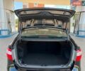 Чорний Кіа Ріо, об'ємом двигуна 1.4 л та пробігом 65 тис. км за 8300 $, фото 9 на Automoto.ua
