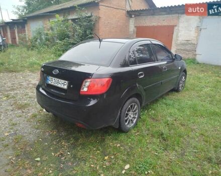 Черный Киа Рио, объемом двигателя 1.4 л и пробегом 133 тыс. км за 5900 $, фото 4 на Automoto.ua