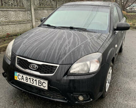 Черный Киа Рио, объемом двигателя 1.4 л и пробегом 105 тыс. км за 4100 $, фото 1 на Automoto.ua