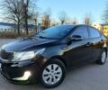 Черный Киа Рио, объемом двигателя 1.6 л и пробегом 231 тыс. км за 7600 $, фото 1 на Automoto.ua