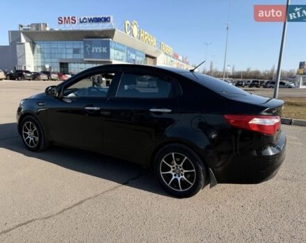 Черный Киа Рио, объемом двигателя 1.4 л и пробегом 162 тыс. км за 7700 $, фото 23 на Automoto.ua