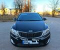 Черный Киа Рио, объемом двигателя 1.6 л и пробегом 231 тыс. км за 7600 $, фото 1 на Automoto.ua