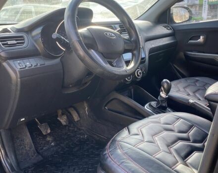 Чорний Кіа Ріо, об'ємом двигуна 1.6 л та пробігом 252 тис. км за 3650 $, фото 7 на Automoto.ua