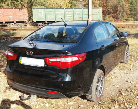 Чорний Кіа Ріо, об'ємом двигуна 1.4 л та пробігом 77 тис. км за 9200 $, фото 1 на Automoto.ua
