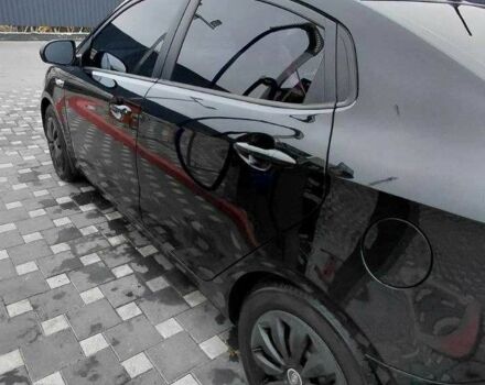 Черный Киа Рио, объемом двигателя 1.4 л и пробегом 100 тыс. км за 7607 $, фото 3 на Automoto.ua