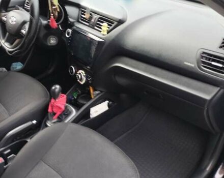 Чорний Кіа Ріо, об'ємом двигуна 1.4 л та пробігом 123 тис. км за 7600 $, фото 8 на Automoto.ua