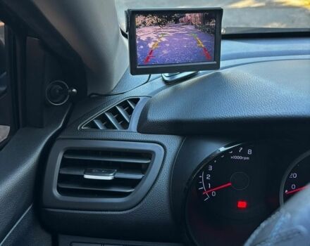 Чорний Кіа Ріо, об'ємом двигуна 1.4 л та пробігом 165 тис. км за 6900 $, фото 17 на Automoto.ua