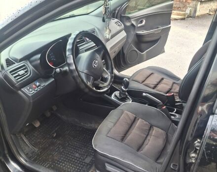 Черный Киа Рио, объемом двигателя 1.4 л и пробегом 197 тыс. км за 7000 $, фото 6 на Automoto.ua