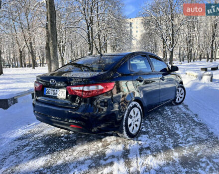 Чорний Кіа Ріо, об'ємом двигуна 1.4 л та пробігом 245 тис. км за 7600 $, фото 11 на Automoto.ua