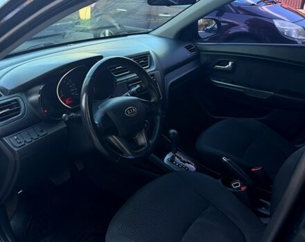 Чорний Кіа Ріо, об'ємом двигуна 1.4 л та пробігом 103 тис. км за 7800 $, фото 5 на Automoto.ua