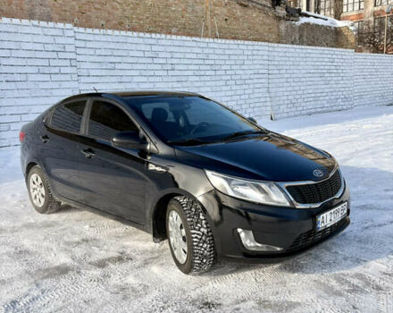 Черный Киа Рио, объемом двигателя 1.6 л и пробегом 270 тыс. км за 6650 $, фото 2 на Automoto.ua