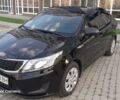 Чорний Кіа Ріо, об'ємом двигуна 1.4 л та пробігом 80 тис. км за 8700 $, фото 1 на Automoto.ua