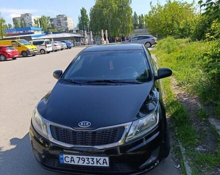 Чорний Кіа Ріо, об'ємом двигуна 1.4 л та пробігом 162 тис. км за 7500 $, фото 2 на Automoto.ua