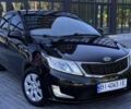 Чорний Кіа Ріо, об'ємом двигуна 1.4 л та пробігом 102 тис. км за 7394 $, фото 1 на Automoto.ua