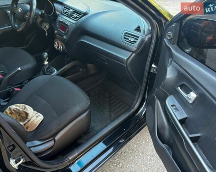 Чорний Кіа Ріо, об'ємом двигуна 1.4 л та пробігом 165 тис. км за 7900 $, фото 31 на Automoto.ua