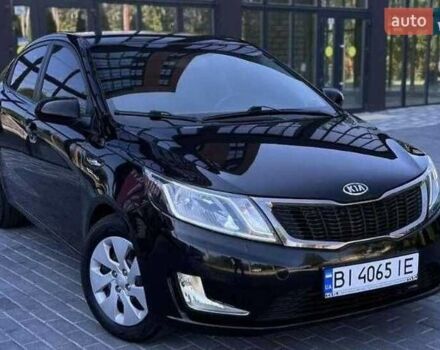 Чорний Кіа Ріо, об'ємом двигуна 1.4 л та пробігом 100 тис. км за 7607 $, фото 11 на Automoto.ua