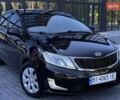 Чорний Кіа Ріо, об'ємом двигуна 1.4 л та пробігом 100 тис. км за 7607 $, фото 11 на Automoto.ua