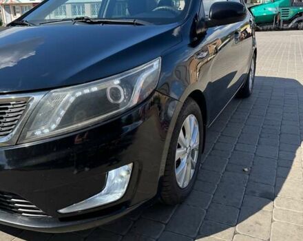Чорний Кіа Ріо, об'ємом двигуна 1.4 л та пробігом 158 тис. км за 8300 $, фото 9 на Automoto.ua