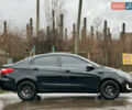 Черный Киа Рио, объемом двигателя 1.6 л и пробегом 231 тыс. км за 7999 $, фото 3 на Automoto.ua