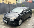 Чорний Кіа Ріо, об'ємом двигуна 1.4 л та пробігом 199 тис. км за 5999 $, фото 1 на Automoto.ua