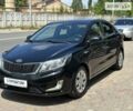 Чорний Кіа Ріо, об'ємом двигуна 1.4 л та пробігом 90 тис. км за 8999 $, фото 6 на Automoto.ua