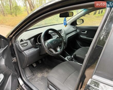 Чорний Кіа Ріо, об'ємом двигуна 1.4 л та пробігом 193 тис. км за 6300 $, фото 14 на Automoto.ua