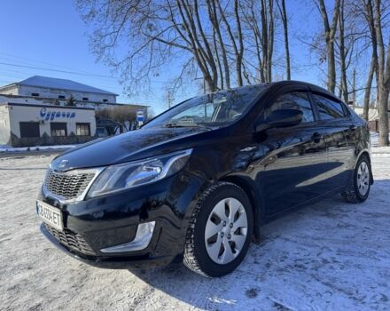 Чорний Кіа Ріо, об'ємом двигуна 1.4 л та пробігом 160 тис. км за 7700 $, фото 1 на Automoto.ua