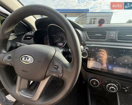 Черный Киа Рио, объемом двигателя 1.4 л и пробегом 74 тыс. км за 8900 $, фото 2 на Automoto.ua