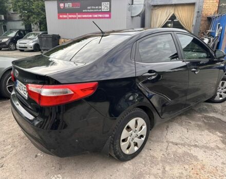 Чорний Кіа Ріо, об'ємом двигуна 1.4 л та пробігом 230 тис. км за 5000 $, фото 3 на Automoto.ua
