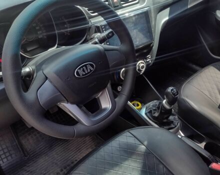 Чорний Кіа Ріо, об'ємом двигуна 1.4 л та пробігом 93 тис. км за 6500 $, фото 7 на Automoto.ua