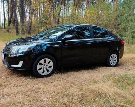 Чорний Кіа Ріо, об'ємом двигуна 0 л та пробігом 125 тис. км за 7099 $, фото 2 на Automoto.ua
