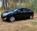 Чорний Кіа Ріо, об'ємом двигуна 0 л та пробігом 125 тис. км за 7099 $, фото 2 на Automoto.ua