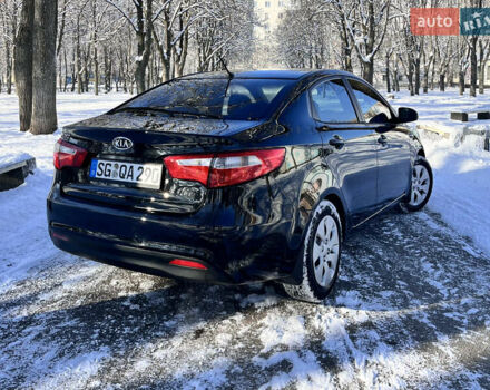 Чорний Кіа Ріо, об'ємом двигуна 1.4 л та пробігом 245 тис. км за 7600 $, фото 16 на Automoto.ua