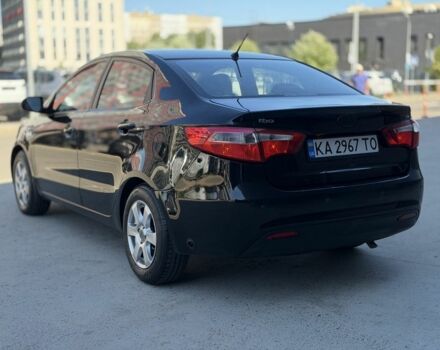 Чорний Кіа Ріо, об'ємом двигуна 1.4 л та пробігом 201 тис. км за 6948 $, фото 2 на Automoto.ua