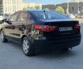 Чорний Кіа Ріо, об'ємом двигуна 1.4 л та пробігом 201 тис. км за 6948 $, фото 2 на Automoto.ua