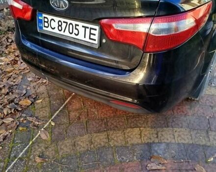 Чорний Кіа Ріо, об'ємом двигуна 1.4 л та пробігом 95 тис. км за 7000 $, фото 4 на Automoto.ua