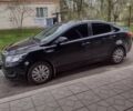Черный Киа Рио, объемом двигателя 1.4 л и пробегом 140 тыс. км за 6800 $, фото 1 на Automoto.ua