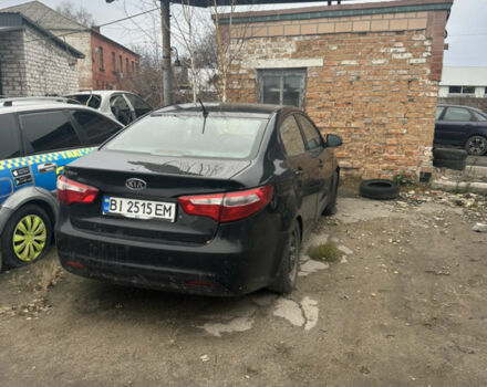 Черный Киа Рио, объемом двигателя 1.4 л и пробегом 100 тыс. км за 3200 $, фото 1 на Automoto.ua