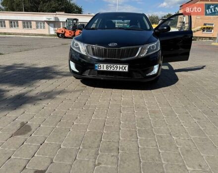 Чорний Кіа Ріо, об'ємом двигуна 1.4 л та пробігом 158 тис. км за 8300 $, фото 21 на Automoto.ua