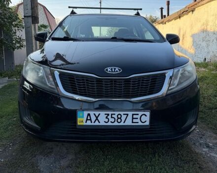 Чорний Кіа Ріо, об'ємом двигуна 1.4 л та пробігом 73 тис. км за 8900 $, фото 2 на Automoto.ua
