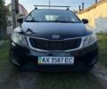 Чорний Кіа Ріо, об'ємом двигуна 1.4 л та пробігом 73 тис. км за 8900 $, фото 2 на Automoto.ua