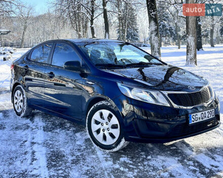 Чорний Кіа Ріо, об'ємом двигуна 1.4 л та пробігом 245 тис. км за 7600 $, фото 8 на Automoto.ua