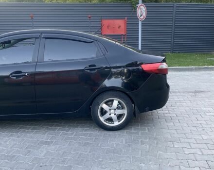 Черный Киа Рио, объемом двигателя 1.6 л и пробегом 330 тыс. км за 6300 $, фото 4 на Automoto.ua