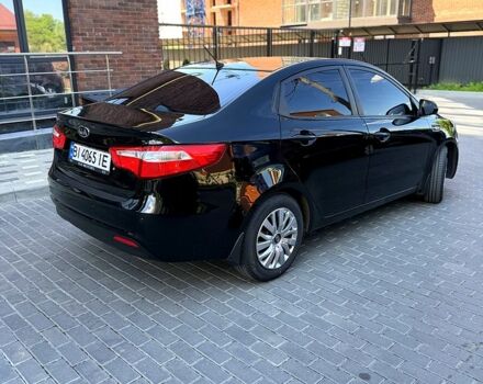 Чорний Кіа Ріо, об'ємом двигуна 1.4 л та пробігом 103 тис. км за 7800 $, фото 3 на Automoto.ua